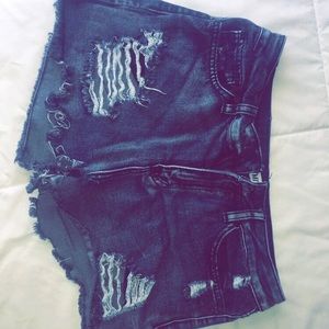 Black ripped shorts